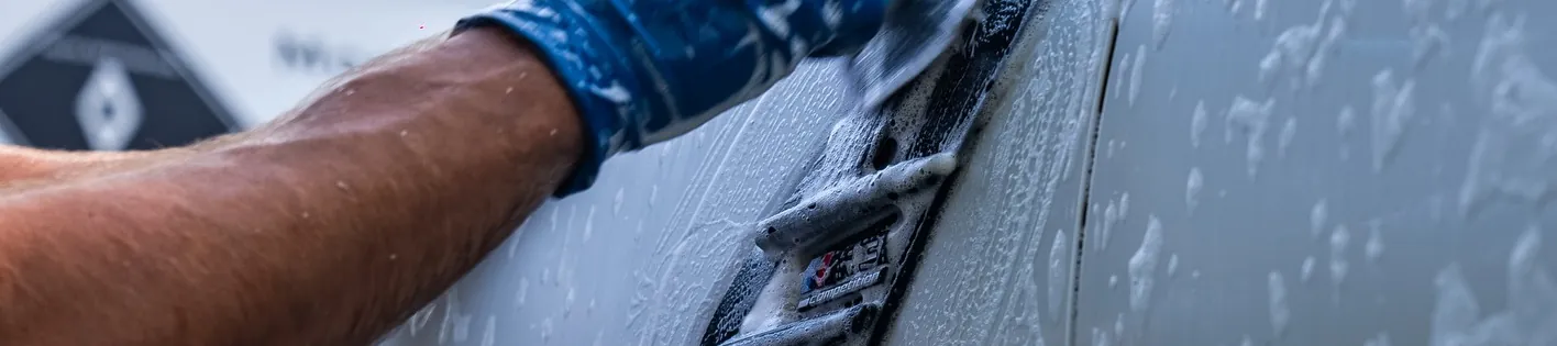 Contact wash on a foamed vehicle panel during a mobile detail in Broome County, NY